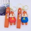 kf Sa1e2c64acd294d1c8424336129dce3ca1 Cartoon animation mouse to treasure keychain cute Alvin Simon Theodore key chain bag accessories wholesale - Alvin And The Chipmunks Merch